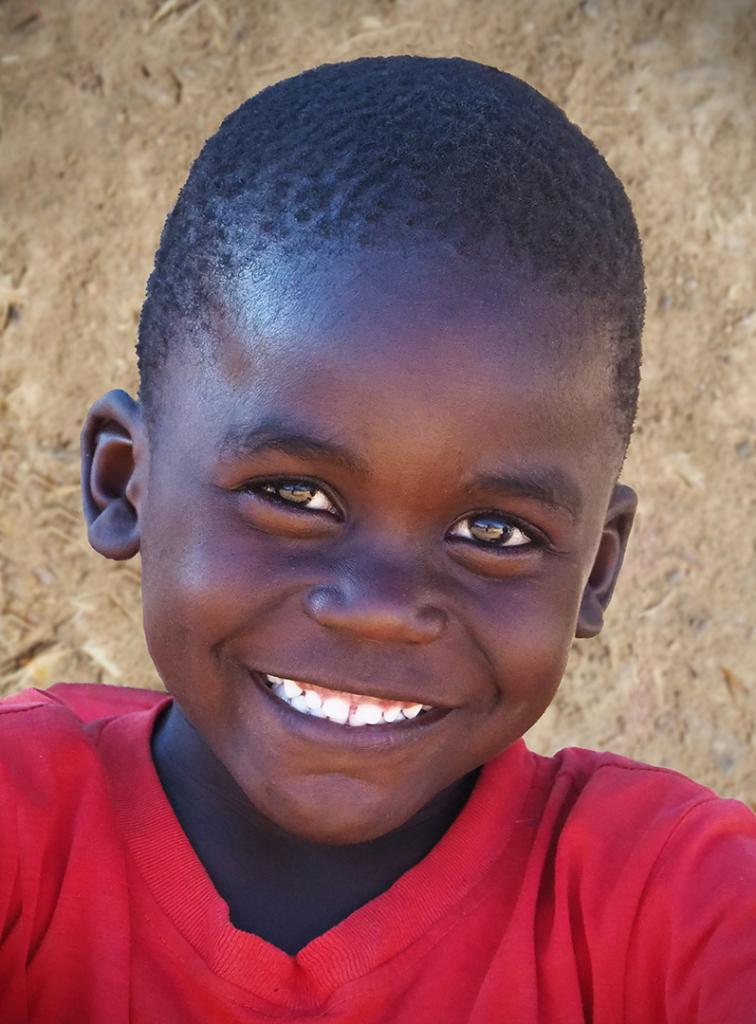 Boy in red by Gil Urquhart