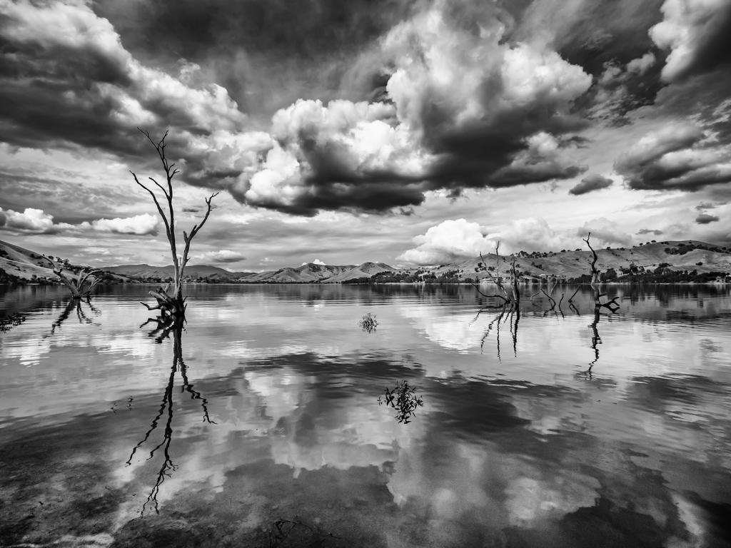 Storm over lake by Michelle Brasington